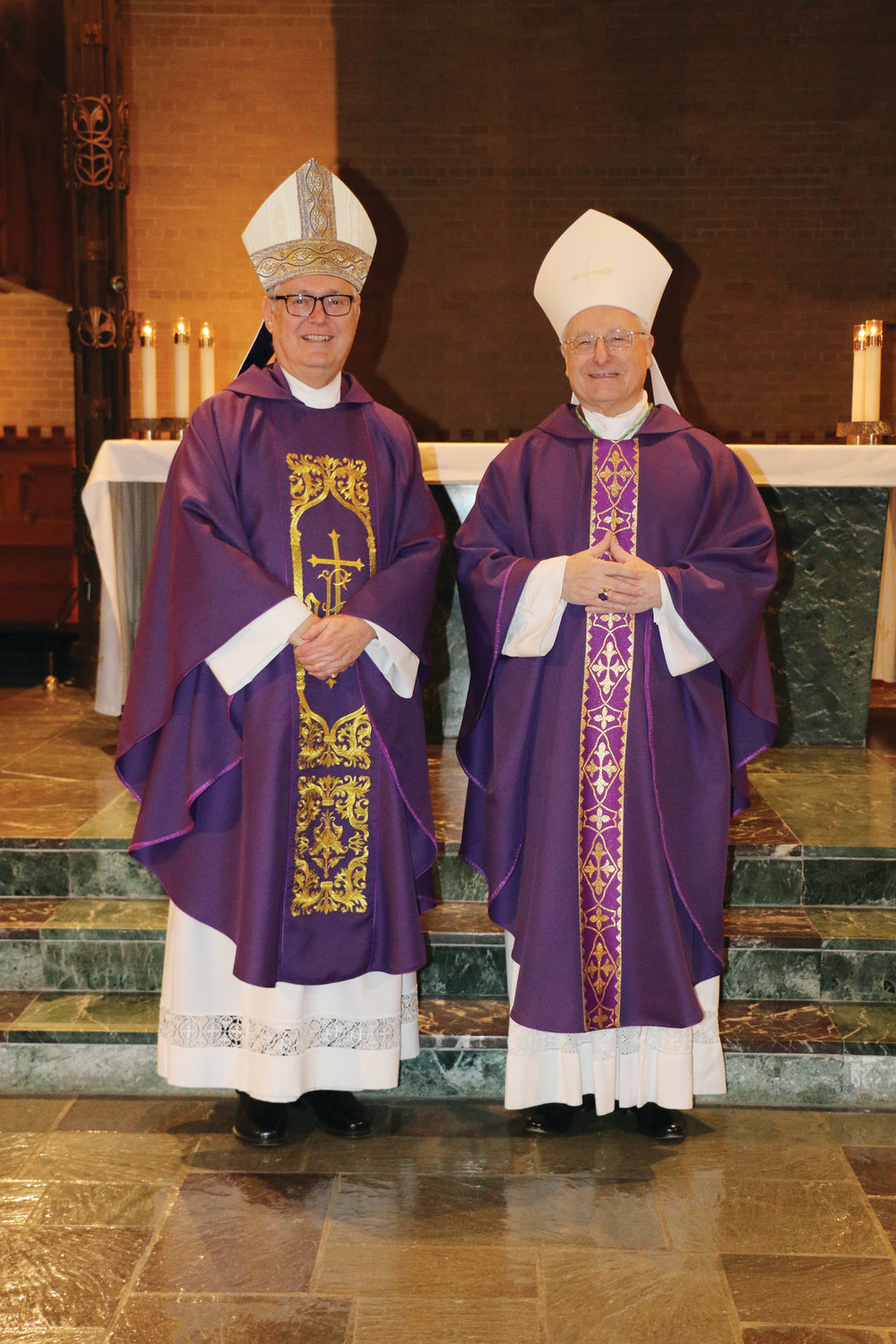 Bishop Tobin pictured with Bishop Evans following Mass held prior to the diocesan employee Christmas dinner on December 11.